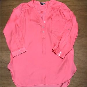 Coral colored blouse